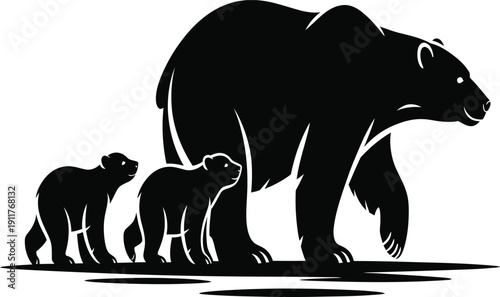 Silhouette of a mother bear and her two cubs walking together