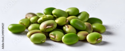 Wallpaper Mural Fava beans lie scattered evoking simplicity and quiet natural beauty on white background Torontodigital.ca