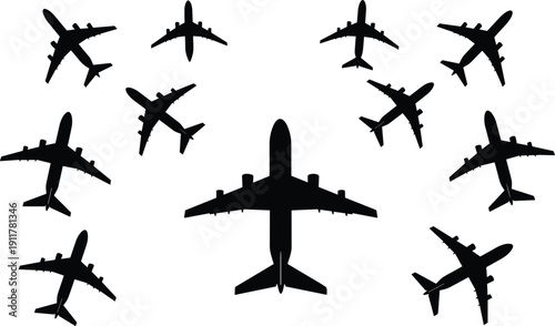 Black silhouettes of airplanes on white background flying