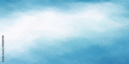 A beautiful summer day features a clear blue sky with white clouds and bright sun, creating a high-altitude cloudscape and an abstract atmosphere of natural beauty in this light outdoor landscape