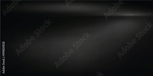 A dark grunge blue background features a spotlight shining on a brushed silver metallic texture with a gray stainless steel plate pattern for a shiny carbon material wallpaper backdrop