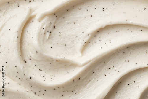 Vanilla Bean Creamy Texture Close-up. Creamy dessert with cookie pieces swirled into rich vanilla ice cream at a casual setting