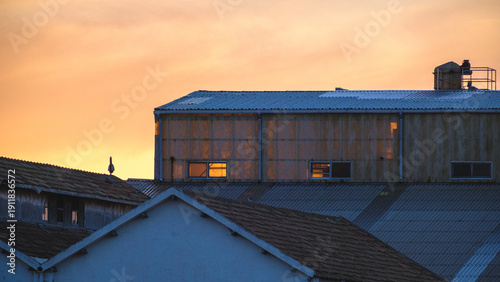 Warm Sunset Over Industrial Rooftop District