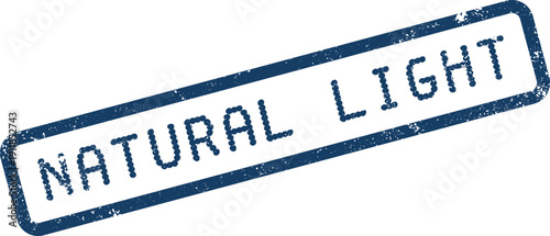 Natural Light word text displayed within a blue distressed rectangular official seal