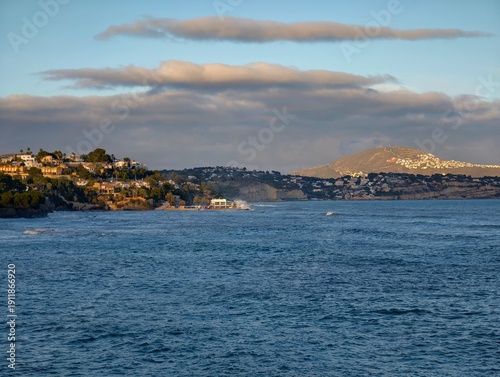 Slika na platnu Coastal houses overlooking rolling hills, Scenic cliffside residence commanding