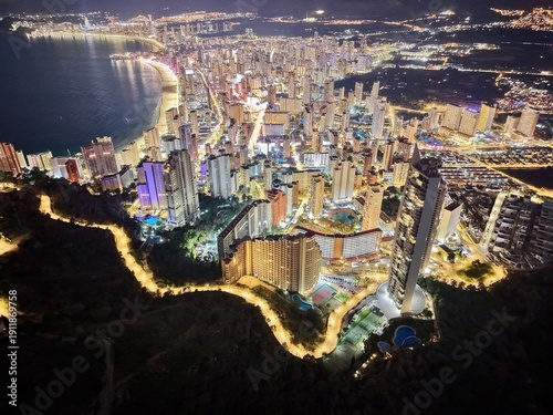 Картината върху платно Serene waterfront scene with ambient lighting, Chic evening skyline reflecting o