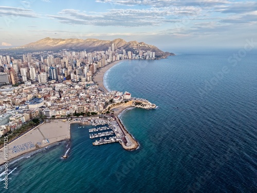 Konstfotografi calm oceanic view with sandy shoreline, peaceful coastal panorama featuring mari