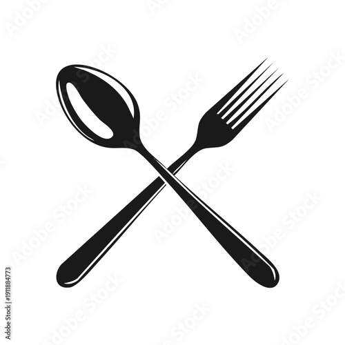 A professional set of silver silverware including a spoon and fork, fork spoon and knife, isolated on a white background as essential metal kitchen utensils for a restaurant dinner table