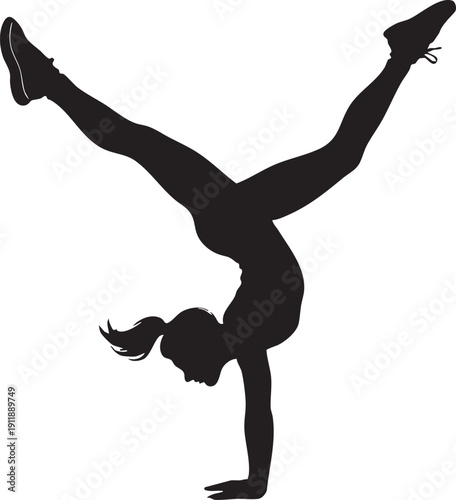Silhouette of a woman doing handstand with legs apart high kick