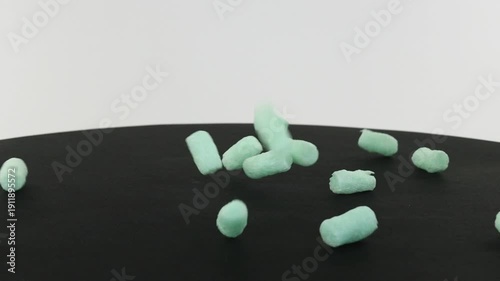 Packing peanuts closeup falling and turning