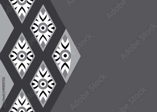 Grayscale ornamental pattern featuring a dark gray field next to a vertical band of interlocking diamond shapes containing white eye motifs with black pupils.
