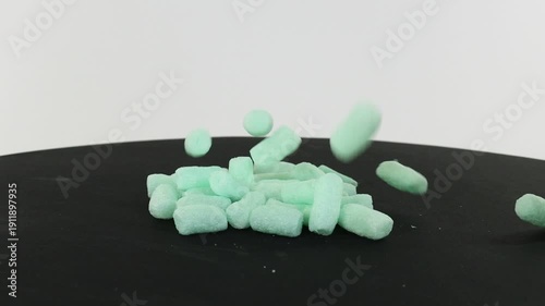 Packing peanuts closeup falling and turning