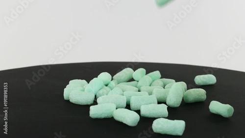 Packing peanuts closeup falling and turning