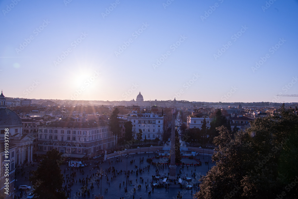 Fototapeta premium Rome at dusk, where the sky melts from gold to rose to deep violet, and every rooftop catches fire for a moment before the night gently steals the light.