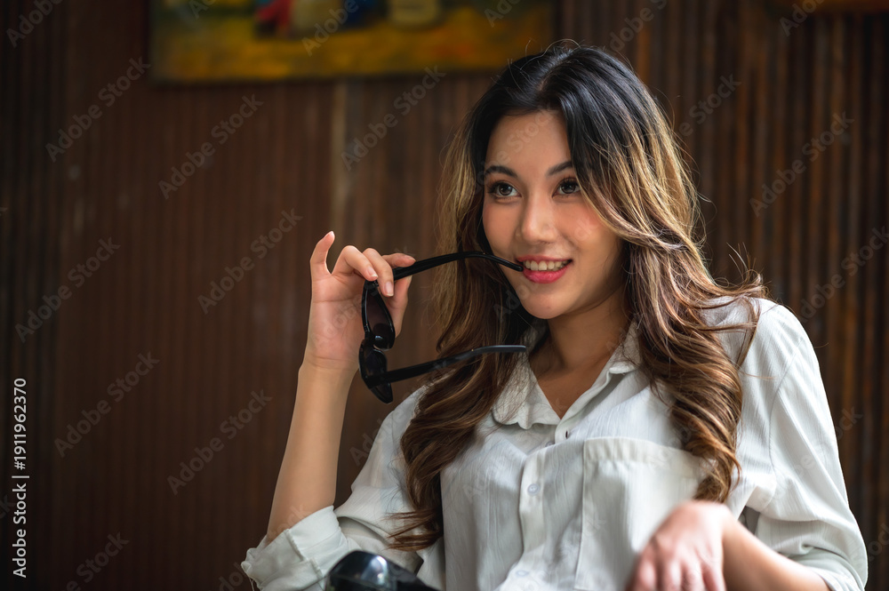 Fototapeta premium Asian pretty fashionable woman in casual cloth relax and enjoying lifestyle 