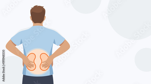 Man experiencing lower back pain while holding his waist  