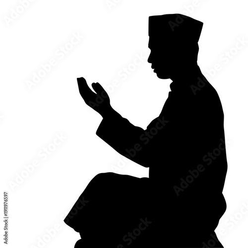 Silhouette of man praying