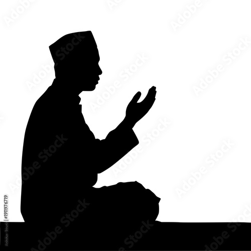 Silhouette of man praying