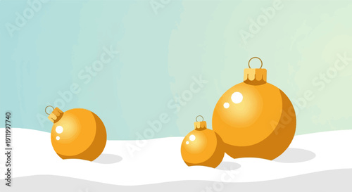 Three golden Christmas baubles nestled in gentle snowdrifts
