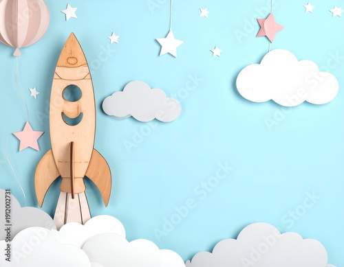 Whimsical scene of a wooden rocket amid paper clouds, stars, and a balloon, against a pastel blue backdrop