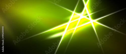 Bright green abstract background. Light flares radiate from central point, creating dynamic visual effect. Dark areas contrast vivid hues.