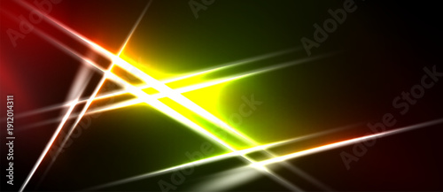 Abstract lines intersect, creating bright light effects. Colors blendred, yellow, greenover dark background. Dynamic energy radiates.