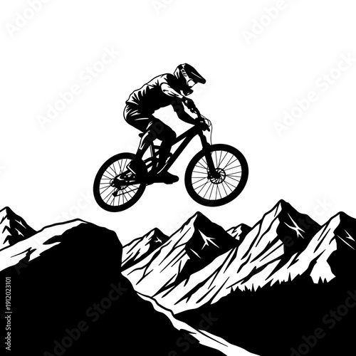 Mountain Biker Silhouette Jumping Over Mountain Peaks