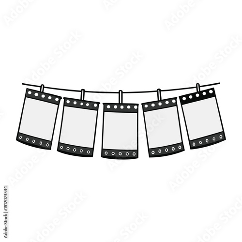 A classic row of film negatives stretches in sequence, each frame capturing memories in shades of gray, evoking nostalgia and the art of analog photography.
