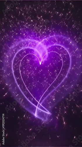 Purple heart shape glowing in sparkling light against dark background  