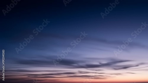 Serene Sunset Sky with Clouds at Dusk.