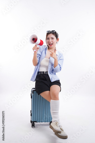 Travel Announcer: A cheerful traveler sits atop luggage, megaphone in hand, poised to announce their next great adventure and share their travel experiences.