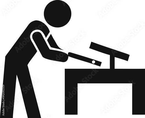 Artisan chiseling intricate details into a wooden object on a workshop table