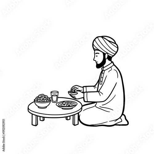 Man in Turban Kneeling Eating Food.