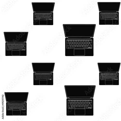Multiple laptops arranged in a grid pattern on a white background viewed from directly above