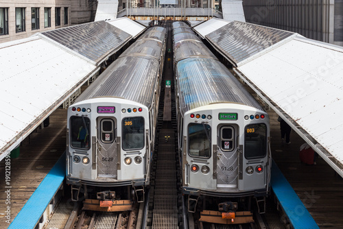 Two Chicago 'L' trains, identified by their car numbers