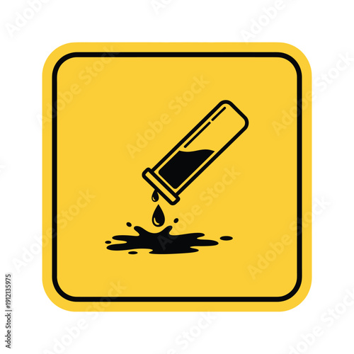 A yellow square warning sign with a black icon of a tilted test tube spilling dark liquid onto the ground, indicating a corrosive or hazardous substance.