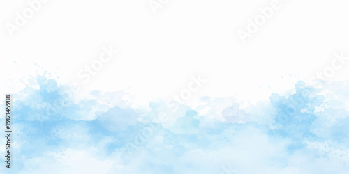 A beautiful, clear blue sky with fluffy white clouds creates a bright and sunny day atmosphere