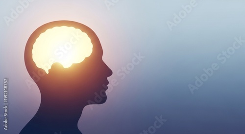 Silhouette of human head with soft glowing light inside representing mental clarity, subtle gradient background, clean minimal composition, World Health Day mental health concept