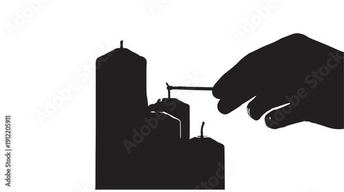 A hand holding a crane constructing a miniature cityscape with industrial buildings from a close-up viewpoint