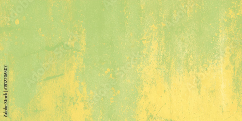 A vintage grunge wood background features aged brown texture and a worn surface pattern with antique yellow paint splatters on a rough, dirty wall design