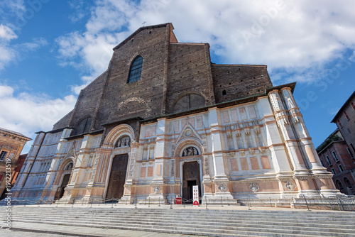 Wallpaper Mural Basilica of San Petronio stands tall on Piazza Maggiore in Bologna, Emilia-Romagna, showing its rich history and architecture under a bright sky Torontodigital.ca
