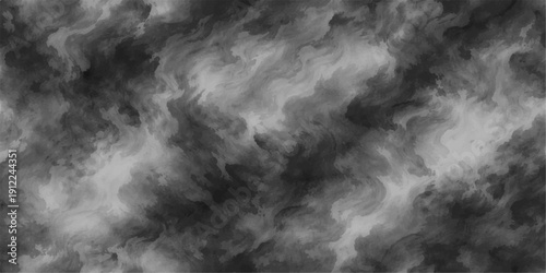 An abstract texture of swirling black and white smoke blends into a dark stormy sky where thick clouds and fog create a dramatic nature backdrop of motion and light