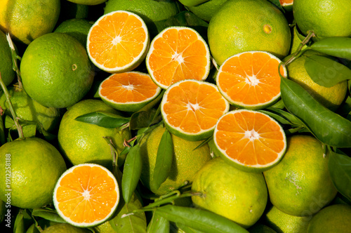 Italy, Sicily, Siracusa, Ortygia.  Ripe green oranges at the market