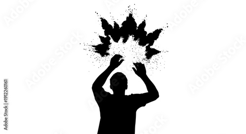 Silhouette of a person with hands raised and an abstract explosion of particles above, representing a moment of impact or creation.