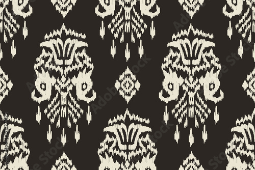 Seamless floral damask pattern Vintage background.Ethnic oriental pattern traditional.Motifs Ikat embroidery wallpaper.Textile rapport. abstract design for texture, fabric, clothing, wrapping