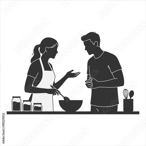 Couple cooking together in kitchen silhouette