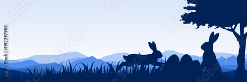 Wide screen spring banner featuring bunnies and easter eggs in blue nature