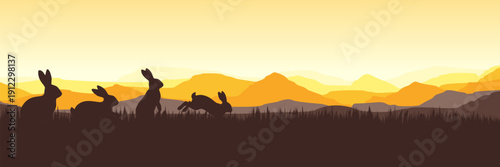 Wide screen spring banner featuring bunnies jumping in sunny yellow nature