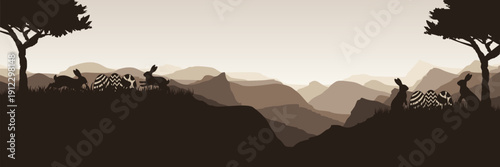 Atmospheric brown horizon with hopping hares and copy space for design