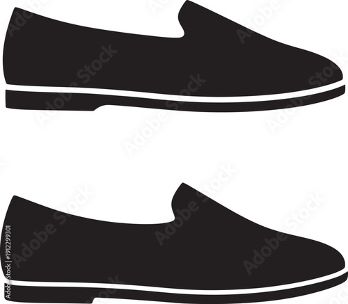 Two black loafers isolated on white background